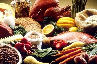 Spread of meats, fish, vegetables, grains and bread