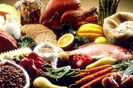 Spread of meats, fish, vegetables, grains and bread