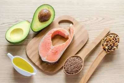 Avocado, salmon, olive oil, nuts and seeds